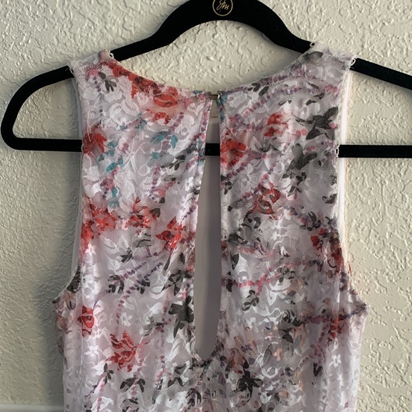 BEBE ROMANTIC LACE ASYMMETRIC RUFFLE DRESS - Picture 6 of 7